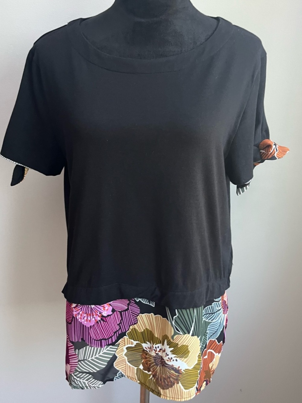 August Silk Black Short-Sleeve Top with Multicolor Floral Hem